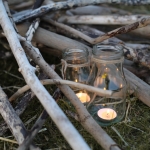 glass bottles/distressed silver tea light holders